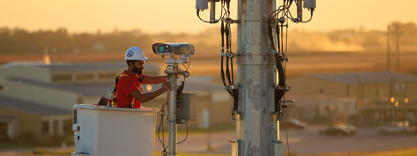 tower maintenance at sunset